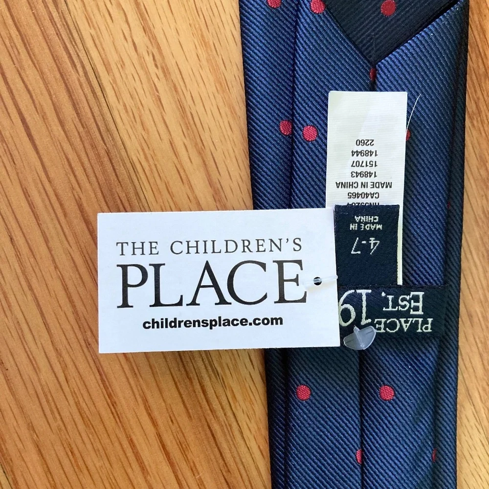 Boy’s size 4-7 NWT Children’s Place navy clip on tie with red polka dots